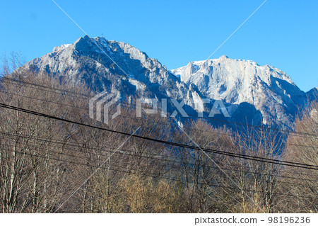 Sunny winter landscape with Bucegi mountains and Busteni ski resort in Romania. Sunny winter landscape with Bucegi mountains and Busteni ski resort in Romania. 98196236