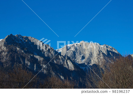 Sunny winter landscape with Bucegi mountains and Busteni ski resort in Romania. Sunny winter landscape with Bucegi mountains and Busteni ski resort in Romania. 98196237