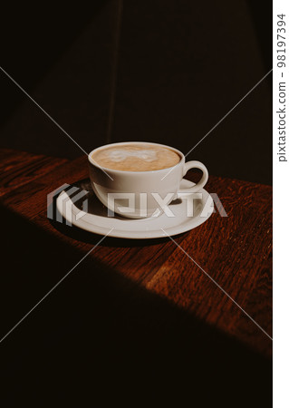 Cup of cappuccino with latte art 98197394