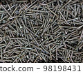 Many black of self-tapping screws. Construction Materials. Texture. Background. 98198431