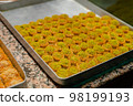 Famous Turkish sweets on a tray showcase market 98199193