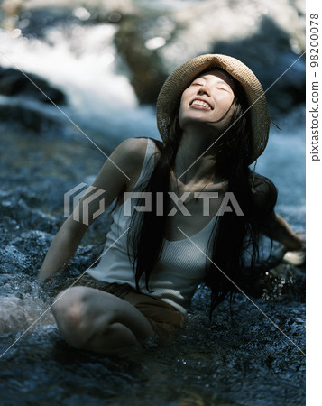 riverside and woman riverside and woman 98200078