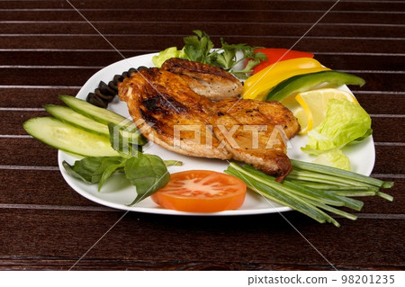 roast chicken in plate roast chicken in plate 98201235