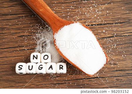 No sugar, sweet granulated sugar with text, diabetes prevention, diet and weight loss for good health. 98203152