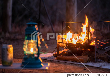Camping lantern and bonfire 98203801