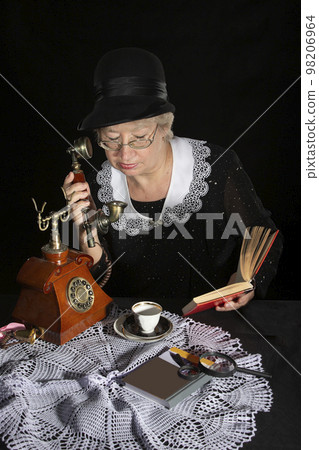 The old woman is like a Miss Marple,woman Miss Marpul, English detective character, woman detective, from the book of Agatha Christie 98206964