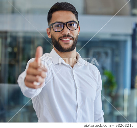 Thumbs up, success and portrait of programmer man in office happy with agreement, feedback or review. Nerd, happiness and it expert in workplace with yes, thank you or winner gesture with smile. Thumbs up, success and portrait of programmer man in office happy with agreement, feedback or review. Nerd, happiness and it expert in workplace with yes, thank you or winner gesture with smile. 98208213