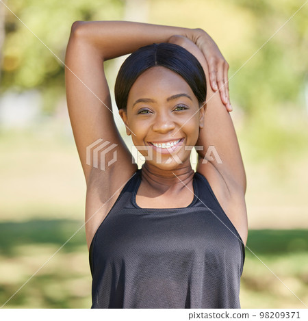 Black woman portrait, fitness and stretching arms in nature park for healthcare wellness, relax exercise or workout sports training. Smile, happy athlete and warm up for muscle pain relief in garden Black woman portrait, fitness and stretching arms in nature park for healthcare wellness, relax exercise or workout sports training. Smile, happy athlete and warm up for muscle pain relief in garden 98209371