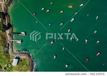 Harbor with piers and boats in Brazil. Aerial view of Ponta das Campanhas in Florianopolis 98210959