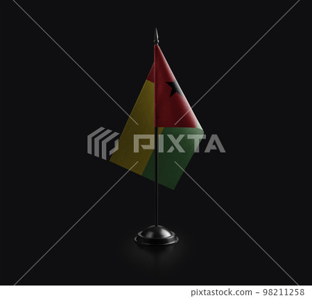 Small national flag of the Guinea Bissau on a black background Small national flag of the Guinea Bissau on a black background 98211258
