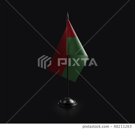 Small national flag of the Burkina Faso on a black background 98211263