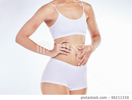 Woman, stomach and slim body, wellness and healthy lifestyle, skincare and fitness on studio background. Closeup model in underwear, beauty and weightloss, diet and nutrition, abdomen and liposuction Woman, stomach and slim body, wellness and healthy lifestyle, skincare and fitness on studio background. Closeup model in underwear, beauty and weightloss, diet and nutrition, abdomen and liposuction 98211338