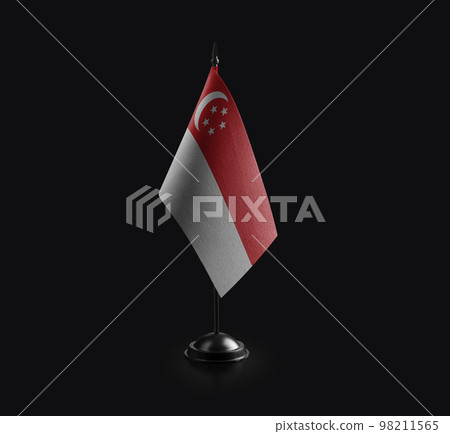 Small national flag of the Singapore on a black background Small national flag of the Singapore on a black background 98211565