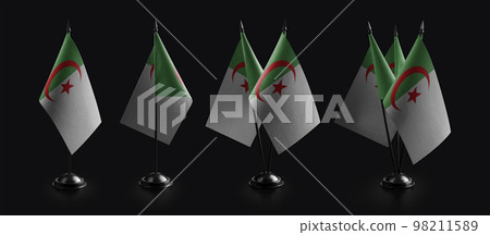 Small national flags of the Algeria on a black background Small national flags of the Algeria on a black background 98211589