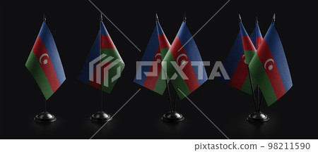 Small national flags of the Azerbaijan on a black background 98211590