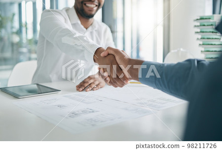 Black man, shaking hands and architecture with architect hiring, interview and onboarding, office and blueprint plan. Human resources, recruitment and partnership with deal, contract and thank you Black man, shaking hands and architecture with architect hiring, interview and onboarding, office and blueprint plan. Human resources, recruitment and partnership with deal, contract and thank you 98211726