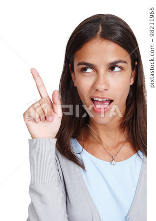 Young woman, thinking and finger with idea, solution or plan against white studio background. Isolated female pointing hand up to solve problem or in thought for light bulb moment on white background 98211968