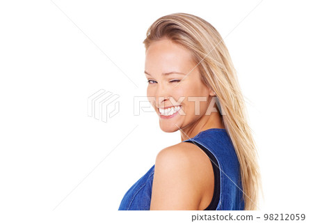 Portrait, wink and mockup with a woman in studio on a white background for friendly flirting. Face, winking and smile with a happy young female posing to promote space for marketing or advertising Portrait, wink and mockup with a woman in studio on a white background for friendly flirting. Face, winking and smile with a happy young female posing to promote space for marketing or advertising 98212059