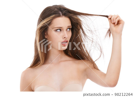 Beauty, hair care and woman with hair damage, loss and worry, isolated on white background. Salon, haircare and hair loss stress and concern on face, confused shocked girl with damaged hair in studio Beauty, hair care and woman with hair damage, loss and worry, isolated on white background. Salon, haircare and hair loss stress and concern on face, confused shocked girl with damaged hair in studio 98212264