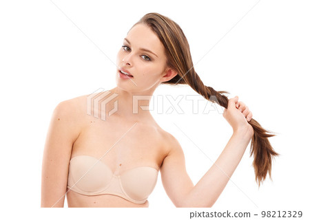 Beauty, hair and salon with portrait of woman for cosmetics, fashion and luxury treatment. Isolated, hair care and shine with face of girl for keratin, glow and self care in white background studio 98212329