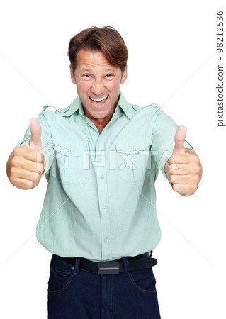 Man, thumbs up and smile in studio portrait with casual fashion, excited and yes by white background. Happy middle aged man, agreement and hand sign with success, isolated and happiness with shirt Man, thumbs up and smile in studio portrait with casual fashion, excited and yes by white background. Happy middle aged man, agreement and hand sign with success, isolated and happiness with shirt 98212536