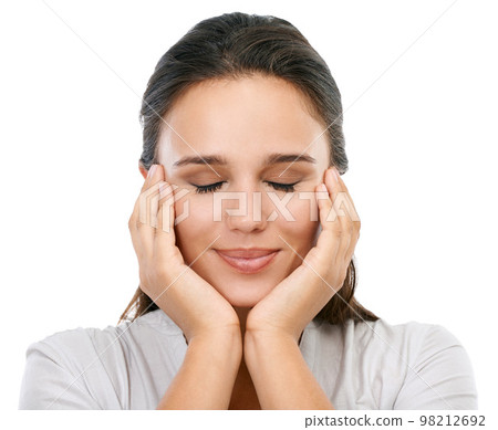 Face, beauty skincare and woman with eyes closed in studio isolated on a white background. Makeup, cosmetics and female model satisfied with spa facial treatment for healthy, glowing or flawless skin 98212692