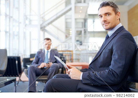 Corporate, portrait or businessman with tablet in office building for communication, networking or blog news. Focus, travel or manager in airport with technology for social media or social network 98214002