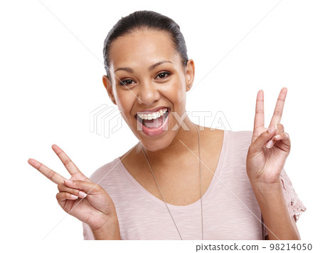 Peace sign, smile and portrait of woman on a white background for happy, relaxing and positive mindset. Beauty, emoji and face of girl isolated in studio with hand gesture for calm, wellness and zen 98214050