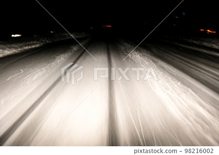 Hachimantai, Iwate Prefecture Snowy road at night in winter 98216002
