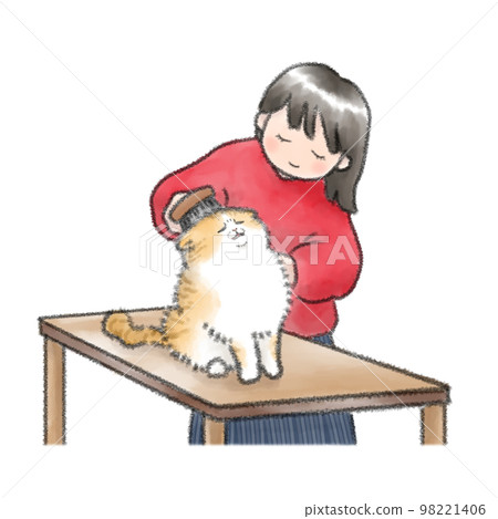 A cat that makes a funny face by brushing 98221406