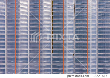 Greenhouses aerial view 98221814