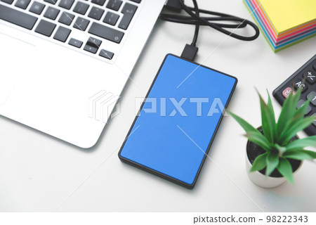 External backup disk drive connected to laptop 98222343