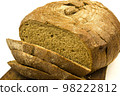 Round bread cut on a board 98222812