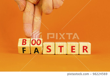 Booster and faster symbol. Concept word Booster Faster on wooden cubes. Businessman hand. Beautiful orange table orange background. Business booster and faster concept. Copy space. Booster and faster symbol. Concept word Booster Faster on wooden cubes. Businessman hand. Beautiful orange table orange background. Business booster and faster concept. Copy space. 98224569