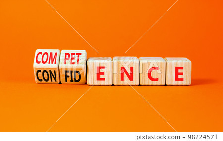 Competence and confidence symbol. Concept word Competence Confidence on wooden cubes. Beautiful orange table orange background. Business competence confidence concept. Copy space. Competence and confidence symbol. Concept word Competence Confidence on wooden cubes. Beautiful orange table orange background. Business competence confidence concept. Copy space. 98224571