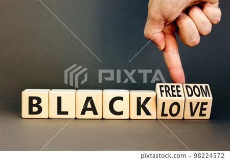 Black freedom and love symbol. Concept words Black freedom Black love on wooden cubes. Businessman hand. Beautiful grey table grey background. Black freedom and love concept. Copy space. Black freedom and love symbol. Concept words Black freedom Black love on wooden cubes. Businessman hand. Beautiful grey table grey background. Black freedom and love concept. Copy space. 98224572