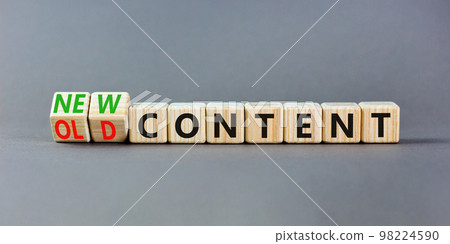 New or old content symbol. Concept words New content and Old content on wooden cubes. Beautiful grey table grey background. Business New or old content concept. Copy space. 98224590