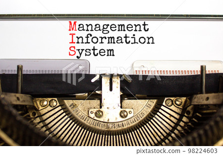 MIS management information system symbol. Concept words MIS management information system typed on retro typewriter. White background. Business MIS management information system concept. Copy space 98224603