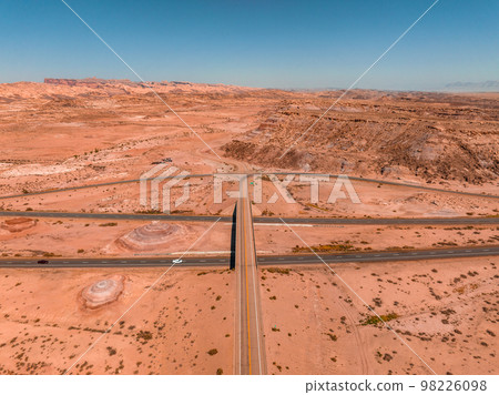 Panoramic image of a lonely, seemingly endless road in the desert of Southern Arizona. Beautiful desert in the middle of nowhere. Panoramic image of a lonely, seemingly endless road in the desert of Southern Arizona. Beautiful desert in the middle of nowhere. 98226098