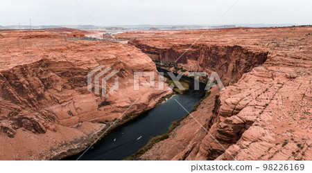 Aerial view of the Grand Canyon Upriver Colorado River Glen Canyon Dam in Arizona USA. Scenic view of the Glen Canyon Dam. Aerial view of the Grand Canyon Upriver Colorado River Glen Canyon Dam in Arizona USA. Scenic view of the Glen Canyon Dam. 98226169