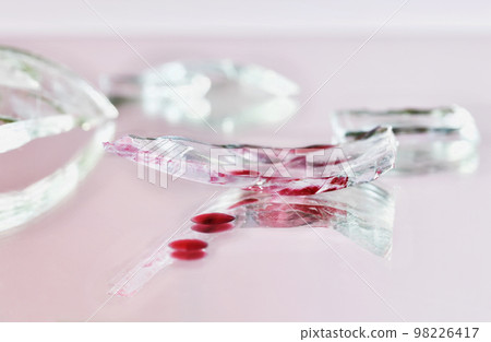 Glass shard with blood Glass shard with blood 98226417