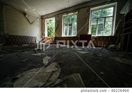 Abandoned old classroom with blue painted walls, dark horrible and dirty classroom. Abandoned old classroom with blue painted walls, dark horrible and dirty classroom. 98226468