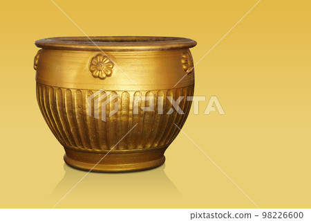 antique gold ceramic pot on yellow background, vintage, retro, antique, old, decor, copy space antique gold ceramic pot on yellow background, vintage, retro, antique, old, decor, copy space 98226600