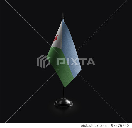 Small national flag of the Djibouti on a black background 98226750