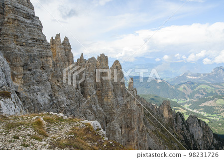 Dolomite rock wall at mountain range. Dolomites UNESCO Italian Alps landscape 98231726