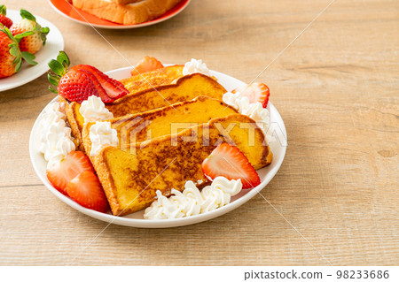 french toast with fresh strawberry and whipping cream french toast with fresh strawberry and whipping cream 98233686