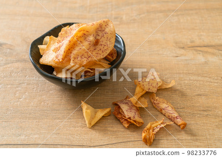 Taro Chips - fried or baked sliced taro Taro Chips - fried or baked sliced taro 98233776