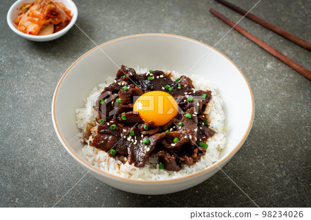 Rice with Soy-Flavoured Pork or Japanese Pork Donburi 98234026