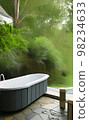 Relax bathtub with natural view in bathroom 98234633