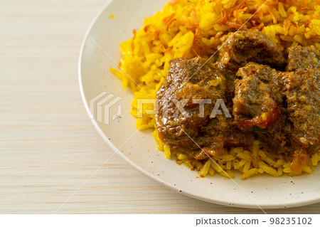 Beef Biryani or Curried rice and beef - Thai-Muslim version of Indian biryani, with fragrant yellow rice and beef 98235102